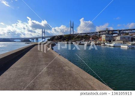 Iwaguro Fishing Port on Iwaguro Island and the Great Seto Bridge (Sakaide City, Kagawa Prefecture) Iwaguro Fishing Port on Iwaguro Island and the Great Seto Bridge (Sakaide City, Kagawa Prefecture) 136105913
