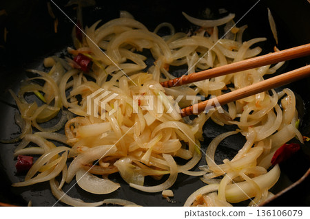 Onions being fried Onions being fried 136106079