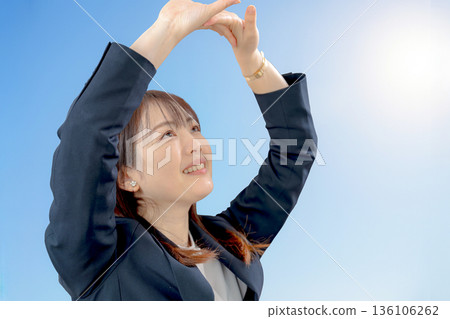 A growing businesswoman A growing businesswoman 136106262