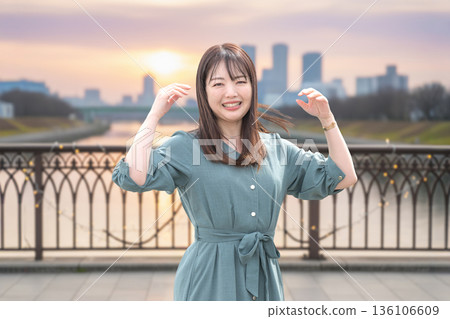 Beautiful woman at sunset 136106609