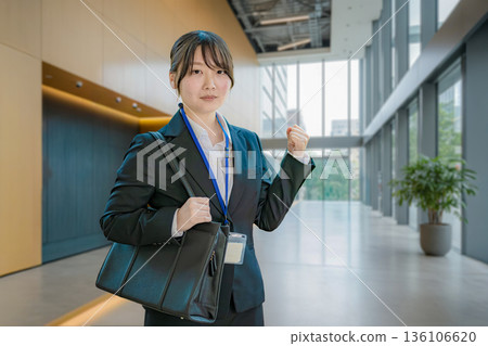 A young woman working A young woman working 136106620