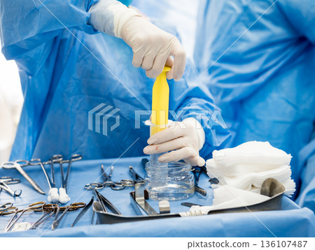 Surgery to remove the breast and replace it with an implant. Surgery to remove the breast and replace it with an implant. 136107487