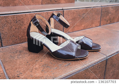 Elegant patent leather sandals high heels blank product for branding displayed. New casual female sandals no-brand footwear e-commerce. No logo product unbranded fashion footwear Elegant patent leather sandals high heels blank product for branding displayed. New casual female sandals no-brand footwear e-commerce. No logo product unbranded fashion footwear 136107703