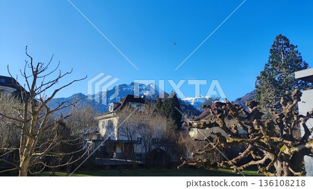 Interlaken, Switzerland - March 17 2023: Surrounding View of Mountanious Interlaken Interlaken, Switzerland - March 17 2023: Surrounding View of Mountanious Interlaken 136108218