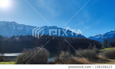 Interlaken,  Switzerland - March 17 2023: Surrounding View of Mountanious Interlaken  136108223