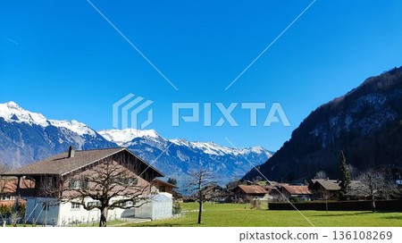 Interlaken, Switzerland - March 17 2023: Surrounding View of Mountanious Interlaken Interlaken, Switzerland - March 17 2023: Surrounding View of Mountanious Interlaken 136108269
