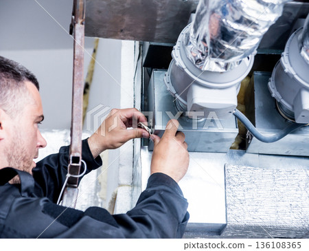Ventilation cleaning. Specialist at work. Repair ventilation system Ventilation cleaning. Specialist at work. Repair ventilation system 136108365