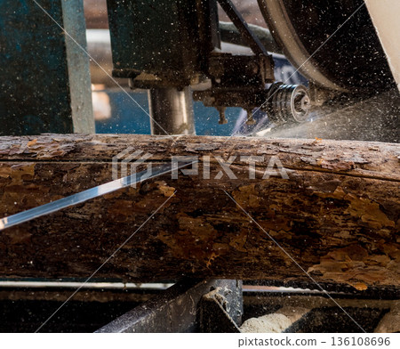 Modern sawmill. Industry sawing boards from logs Modern sawmill. Industry sawing boards from logs 136108696