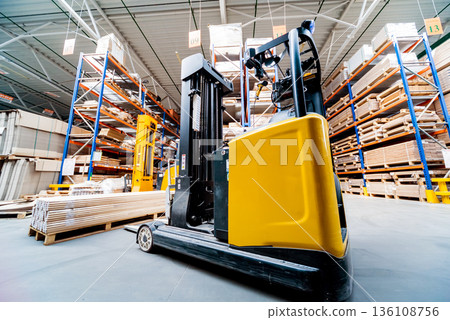 Forklift loader in storage warehouse ship yard. Distribution products. Forklift loader in storage warehouse ship yard. Distribution products. 136108756