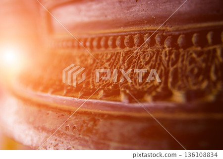 Symbols of Buddhism. Bells. South-Eastern Asia. Details of buddhist temple  136108834