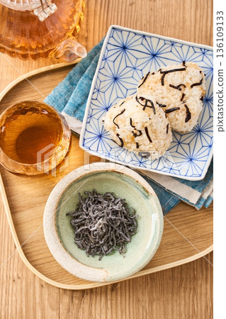 Salted kelp and salted kelp rice balls in a small bowl Salted kelp and salted kelp rice balls in a small bowl 136109133