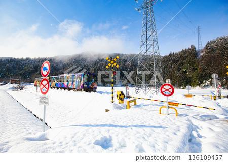 Winter scenery in the mountains and a train 136109457