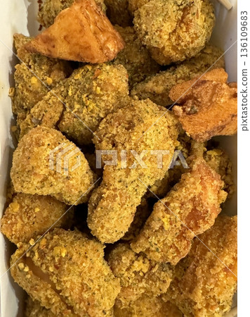 Crispy fried chicken with golden, crunchy skin and juicy, tender meat. A delicious and savory dish, perfect for any meal, served with dipping sauces or side dishes for extra flavor! Crispy fried chicken with golden, crunchy skin and juicy, tender meat. A delicious and savory dish, perfect for any meal, served with dipping sauces or side dishes for extra flavor! 136109683