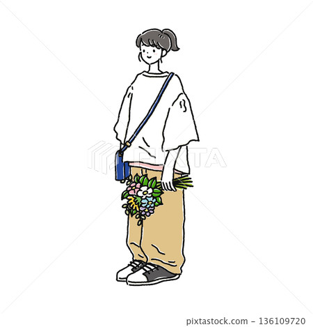 A woman in a natural outfit holding a bouquet 136109720