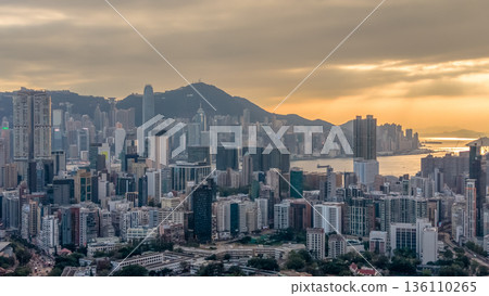 Warm Sunset Illuminates Yau Tsim Mong Skyline And Harbour Warm Sunset Illuminates Yau Tsim Mong Skyline And Harbour 136110265