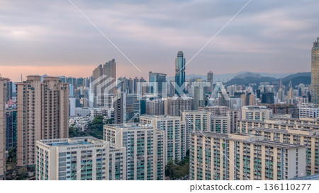 Soft Daylight Illuminates Ho Man Tin Skyline And Mountains 136110277