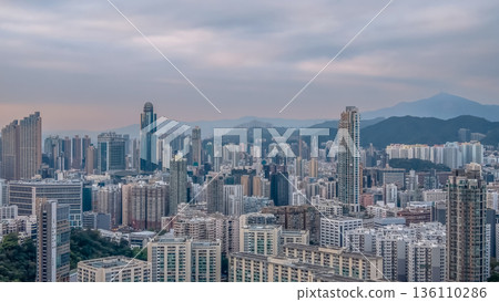 Soft Evening Light Illuminates Dense Skyline Across Mong Kok 136110286
