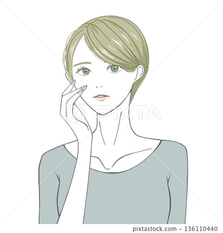 A blonde woman with her hand on her right cheek A blonde woman with her hand on her right cheek 136110440