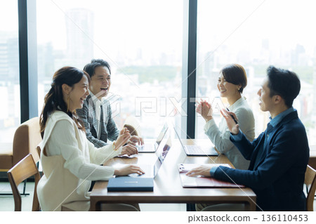 Businessmen having a meeting Businessmen having a meeting 136110453