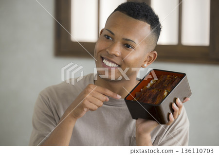 Foreign man enjoying Japanese food Foreign man enjoying Japanese food 136110703