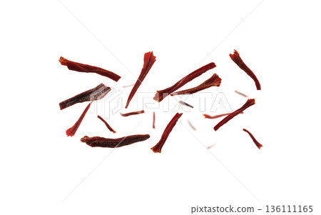 Saffron stamens levitate on a white background 136111165