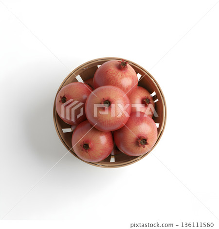 Pomegranate Fruit In Natural Woven Basket Top View 136111560