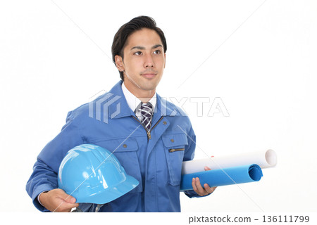 Workers with helmets 136111799