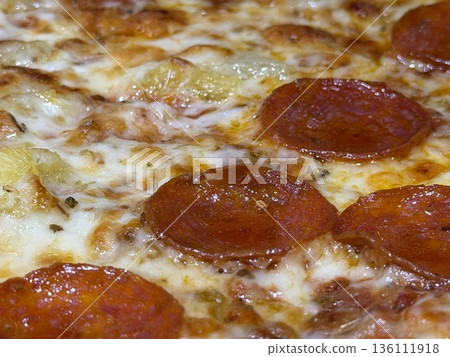 Hot Pepperoni Pizza Close Up with Melting Cheese and Freshly Baked Texture Hot Pepperoni Pizza Close Up with Melting Cheese and Freshly Baked Texture 136111918
