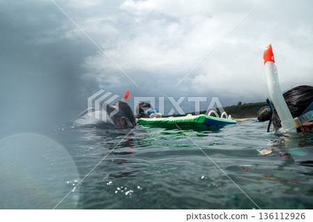 snorkeling, family, blue water 136112926
