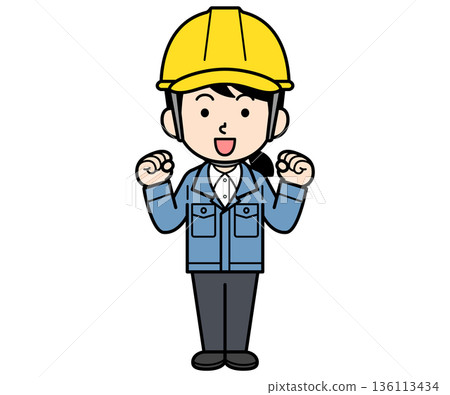 A female site supervisor wearing a helmet pumping her fist A female site supervisor wearing a helmet pumping her fist 136113434
