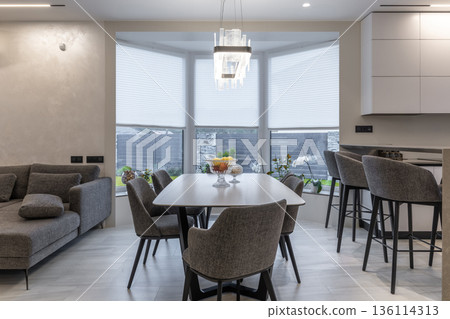 Open plan modern living and dining room with luxury furniture Open plan modern living and dining room with luxury furniture 136114313