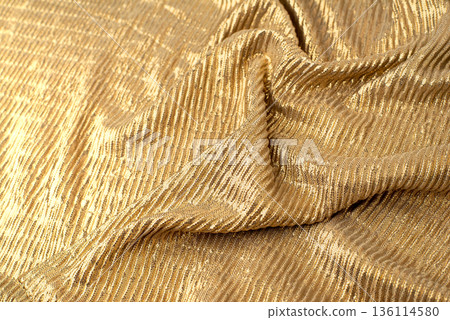 A close-up shot of gold sequin fabric A close-up shot of gold sequin fabric 136114580