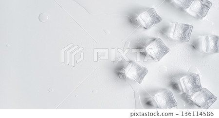 Melting ice cubes on a white background 136114586