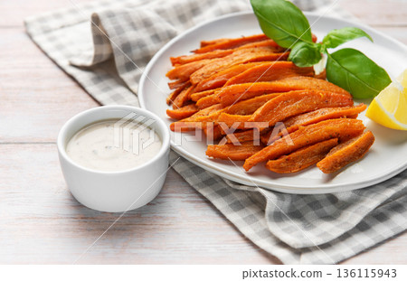 Sweet potato fries with dip, basil, and lemon Sweet potato fries with dip, basil, and lemon 136115943