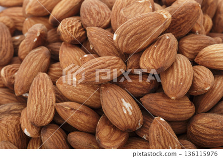 Almonds isolated on a white background 136115976