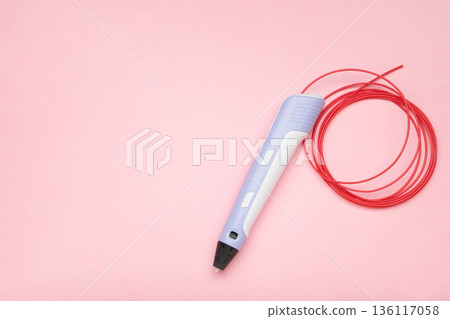 Purple 3D pen for kids creativity on pink background. Purple 3D pen for kids creativity on pink background. 136117058