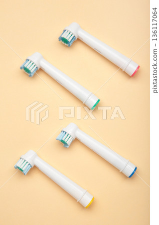 Mykolaiv, Ukraine - January 20, 2026: Oral-B Electric Toothbrush Replacement Brush Heads on beige background 136117064
