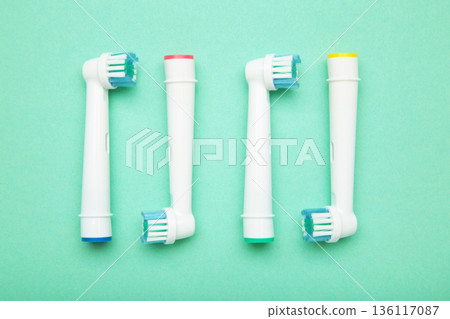 Mykolaiv, Ukraine - January 20, 2026: Oral-B Electric Toothbrush Replacement Brush Heads on mint background Mykolaiv, Ukraine - January 20, 2026: Oral-B Electric Toothbrush Replacement Brush Heads on mint background 136117087