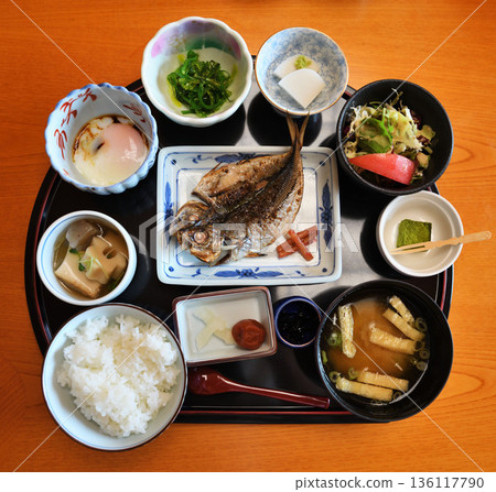 Japanese breakfast set at a ryokan Japanese breakfast with grilled fish and miso soup Japanese breakfast set at a ryokan Japanese breakfast with grilled fish and miso soup 136117790