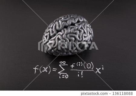 Human brain model with difficult formula math drawn with chalk on scholl blackboard. Science, education and learning concept. 136118088