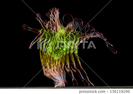 Stroboscopic tennis overhead serve motion sequence on black background. Stroboscopic tennis overhead serve motion sequence on black background. 136119200