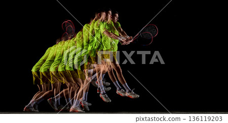 Stroboscopic tennis backhand swing sequence on black background. 136119203