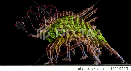 Tennis serve motion sequence in stroboscopic action on black background. Tennis serve motion sequence in stroboscopic action on black background. 136119205