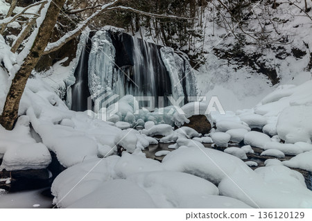 Tatsuzawafudo Falls in the snowy landscape 136120129