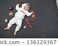 Sleeping Baby in Christmas Outfit 136120367