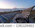 Migita Beach in the morning glow, benches and a quiet seaside promenade 136120401