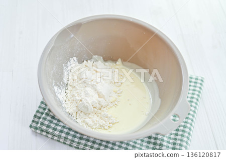 Add flour to melted chocolate 136120817