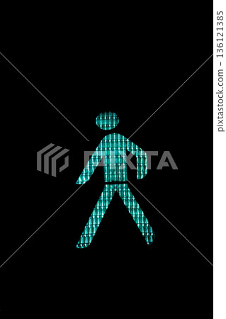 Green light on a pedestrian traffic light Green light on a pedestrian traffic light 136121385