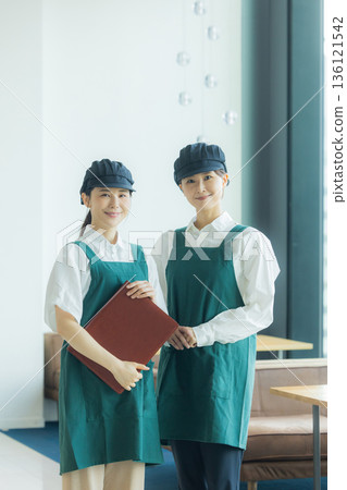 Two cafe staff Two cafe staff 136121542