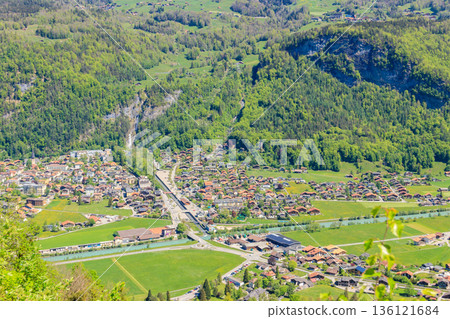 Panoramic view of Meiringen, near Reichenbach falls (Reichenbachfall) at the Swiss Alps in Switzerland Panoramic view of Meiringen, near Reichenbach falls (Reichenbachfall) at the Swiss Alps in Switzerland 136121684